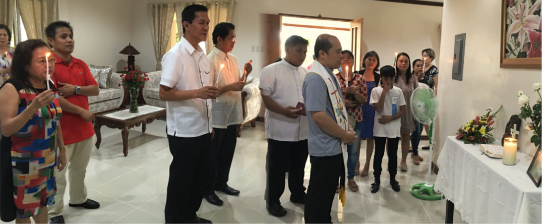 House Blessing inside the living room of the Presidential Cottage.